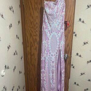 Size 5 Formal Dress. New with tags.